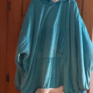 Original Comfy in Aqua, gently used, like new condition. No rips or tears.